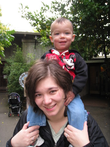 Riding on Mama's shoulders