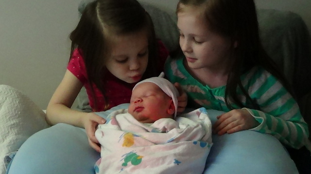Baby Cousin meets his sisters