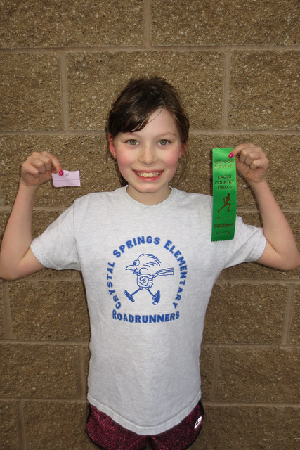 Ane, with her finisher's ribbon